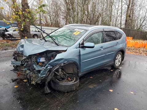 2014 Honda CR-V, VIN 2HKRM4H7XEH670945. Фото 1 з 6 з аукціону Copart. Каталог авто зі США OpenDataCar.