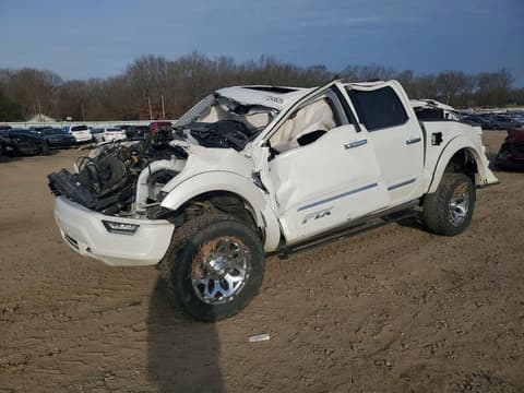 2021 Ford F-150 Lightning, VIN 1FTFW1E51MFA09800. Фото 1 з 6 з аукціону Copart. Каталог авто зі США OpenDataCar.