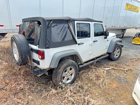 2014 Jeep Wrangler Unlimited, VIN 1C4HJWDG0EL208119. Photo 4 of 6 from Copart auction. OpenDataCar US salvage catalog.