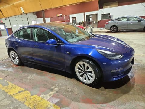 2023 Tesla Model 3, VIN 5YJ3E1EA8PF451999. Фото 4 з 6 з аукціону Copart. Каталог авто зі США OpenDataCar.