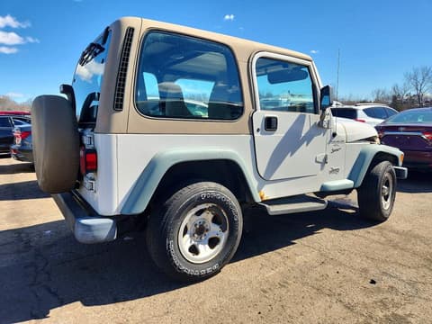 1999 Jeep Wrangler, VIN 1J4FY19S2XP435529. Фото 3 из 6 с аукциона Copart. Каталог авто из США OpenDataCar.