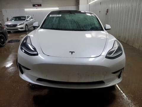 2023 Tesla Model 3, VIN 5YJ3E1ECXPF667791. Фото 5 з 6 з аукціону Copart. Каталог авто зі США OpenDataCar.