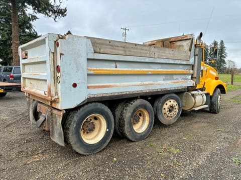 1993 Kenworth Construction, VIN 1XKDDR9X9PJ598382. Photo 4 of 6 from Copart auction. OpenDataCar US salvage catalog.