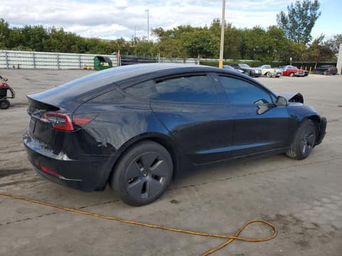 2023 Tesla Model 3, VIN 5YJ3E1EA3PF396197. Фото 3 из 6 с аукциона Copart. Каталог авто из США OpenDataCar.