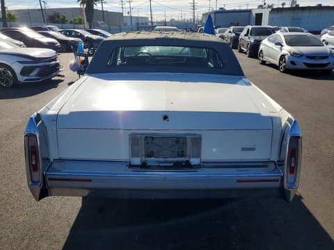 1991 Cadillac Brougham, VIN 1G6DW5477MR708867. Фото 6 з 6 з аукціону Copart. Каталог авто зі США OpenDataCar.