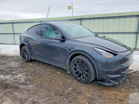 2025 Tesla Model Y, VIN 7SAYGDEEXSF297859. Фото 4 з 6 з аукціону Copart. Каталог авто зі США OpenDataCar.