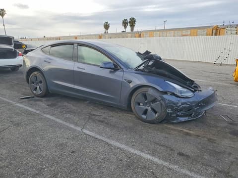 2022 Tesla Model 3, VIN 5YJ3E1EB4NF314239. Фото 4 з 6 з аукціону Copart. Каталог авто зі США OpenDataCar.