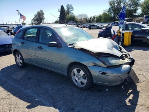 2004 Ford Focus, VIN 3FAFP37Z74R110972. Фото 4 из 6 с аукциона Copart. Каталог авто из США OpenDataCar.