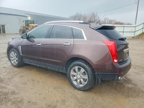 2015 Cadillac SRX, VIN 3GYFNBE36FS621717. Фото 2 з 6 з аукціону Copart. Каталог авто зі США OpenDataCar.