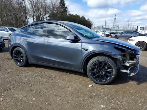 2023 Tesla Model Y, VIN 7SAYGDEE4PF584959. Фото 4 з 6 з аукціону Copart. Каталог авто зі США OpenDataCar.