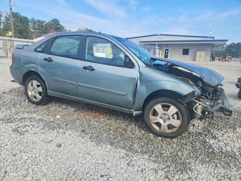 2005 Ford Focus, VIN 1FAFP34N05W250393. Фото 4 з 6 з аукціону Copart. Каталог авто зі США OpenDataCar.