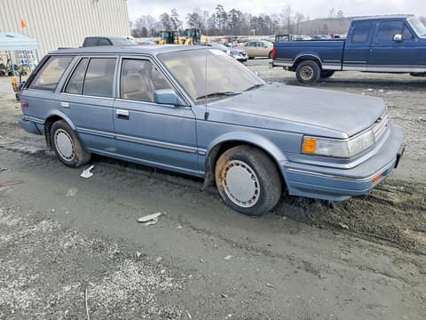 1987 Nissan Maxima, VIN JN1HU15P9HX062649. Photo 4 of 6 from Copart auction. OpenDataCar US salvage catalog.