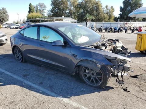 2023 Tesla Model 3, VIN 5YJ3E1EA1PF692173. Фото 4 з 6 з аукціону Copart. Каталог авто зі США OpenDataCar.