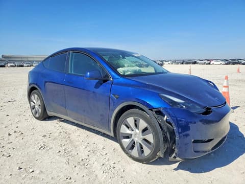2023 Tesla Model Y, VIN 7SAYGDEE5PA199990. Фото 4 з 6 з аукціону Copart. Каталог авто зі США OpenDataCar.