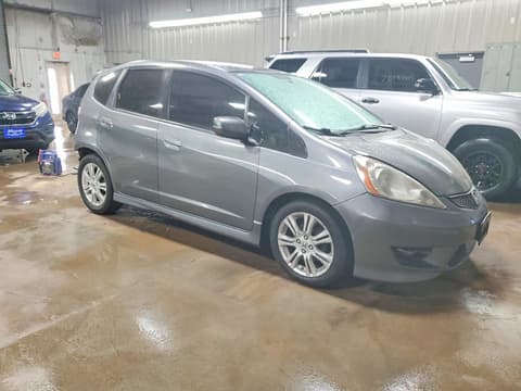 2011 Honda Fit, VIN JHMGE8H5XBC004863. Фото 4 з 6 з аукціону Copart. Каталог авто зі США OpenDataCar.