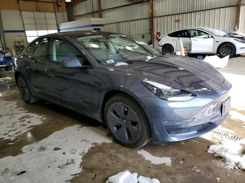2023 Tesla Model 3, VIN 5YJ3E1EB8PF663942. Фото 4 з 6 з аукціону Copart. Каталог авто зі США OpenDataCar.
