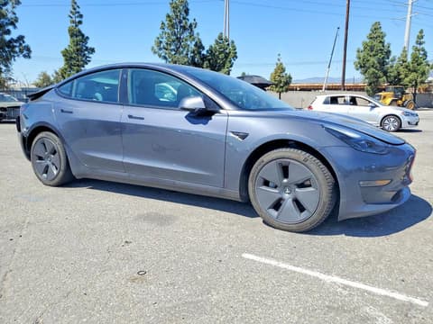 2022 Tesla Model 3, VIN 5YJ3E1EB2NF205682. Фото 4 з 6 з аукціону Copart. Каталог авто зі США OpenDataCar.