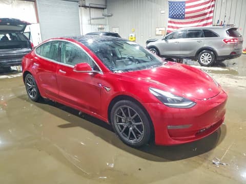 2020 Tesla Model 3, VIN 5YJ3E1EB1LF664201. Фото 4 з 6 з аукціону Copart. Каталог авто зі США OpenDataCar.