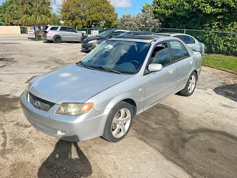 2002 Mazda Protege, VIN JM1BJ225620627265. Фото 2 из 6 с аукциона Copart. Каталог авто из США OpenDataCar.
