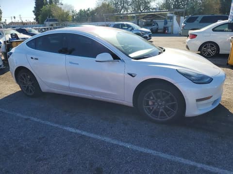 2018 Tesla Model 3, VIN 5YJ3E1EA1JF022999. Photo 4 of 6 from Copart auction. OpenDataCar US salvage catalog.