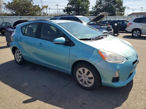 2014 Toyota Prius C, VIN JTDKDTB39E1063556. Фото 4 з 6 з аукціону Copart. Каталог авто зі США OpenDataCar.