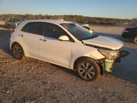 2023 Kia Rio, VIN 3KPA25AD8PE511874. Photo 4 of 6 from Copart auction. OpenDataCar US salvage catalog.