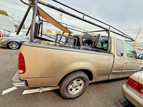 2001 Ford F-150 Lightning, VIN 1FTRX17L81NA76272. Фото 4 з 6 з аукціону Copart. Каталог авто зі США OpenDataCar.