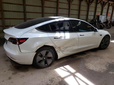 2021 Tesla Model 3, VIN 5YJ3E1EAXMF861859. Фото 3 з 6 з аукціону Copart. Каталог авто зі США OpenDataCar.