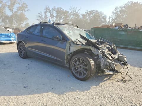 2023 Tesla Model 3, VIN 5YJ3E1EA7PF648775. Фото 4 з 6 з аукціону Copart. Каталог авто зі США OpenDataCar.