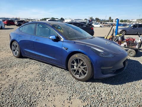 2022 Tesla Model 3, VIN 5YJ3E1EA8NF128999. Фото 4 з 6 з аукціону Copart. Каталог авто зі США OpenDataCar.