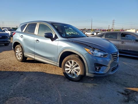 2016 Mazda CX-5, VIN JM3KE4CY7G0878772. Фото 4 з 6 з аукціону Copart. Каталог авто зі США OpenDataCar.