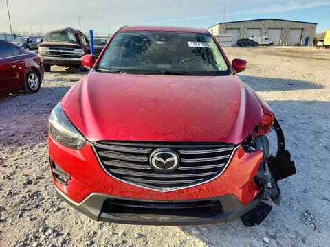 2016 Mazda CX-5, VIN JM3KE4DY0G0717811. Фото 5 з 6 з аукціону Copart. Каталог авто зі США OpenDataCar.