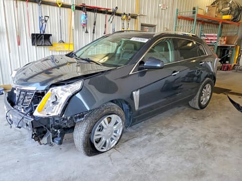 2015 Cadillac SRX, VIN 3GYFNBE35FS558724. Фото 1 з 6 з аукціону Copart. Каталог авто зі США OpenDataCar.