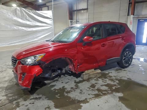 2016 Mazda CX-5, VIN JM3KE4DY3G0679698. Фото 1 з 6 з аукціону Copart. Каталог авто зі США OpenDataCar.
