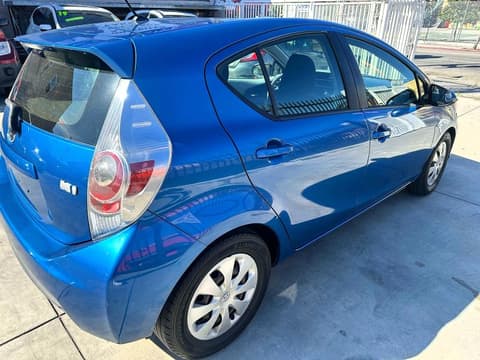 2014 Toyota Prius C, VIN JTDKDTB39E1561112. Фото 4 з 6 з аукціону Copart. Каталог авто зі США OpenDataCar.