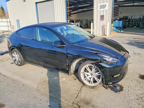 2023 Tesla Model Y, VIN 7SAYGDEE2PF748354. Фото 4 з 6 з аукціону Copart. Каталог авто зі США OpenDataCar.