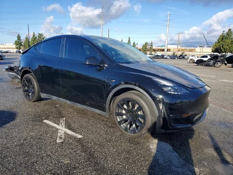 2023 Tesla Model Y, VIN 7SAYGDEE7PF796738. Фото 4 из 6 с аукциона Copart. Каталог авто из США OpenDataCar.