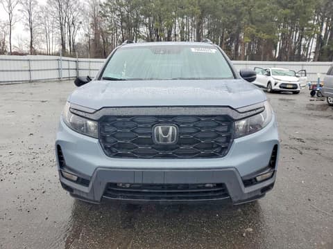 2023 Honda Passport, VIN 5FNYF8H00PB023620. Фото 5 з 6 з аукціону Copart. Каталог авто зі США OpenDataCar.