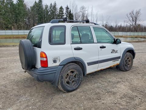 2001 Chevrolet Tracker, VIN 2CNBJ734316921971. Zdjęcie 3 z 6 z aukcji Copart. Katalog aut z USA OpenDataCar.