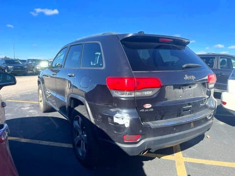 2014 Jeep Grand Cherokee, VIN 1C4RJFBG8EC172591. Фото 4 з 6 з аукціону Copart. Каталог авто зі США OpenDataCar.