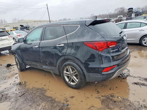2017 Hyundai Santa Fe, VIN 5XYZT3LB4HG379958. Zdjęcie 2 z 6 z aukcji Copart. Katalog aut z USA OpenDataCar.