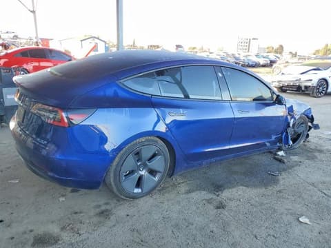 2023 Tesla Model 3, VIN 5YJ3E1EA3PF453563. Фото 3 з 6 з аукціону Copart. Каталог авто зі США OpenDataCar.