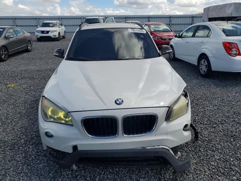 2014 Bmw X1, VIN WBAVM1C51EVW52592. Фото 5 з 6 з аукціону Copart. Каталог авто зі США OpenDataCar.