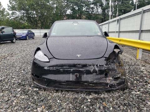 2025 Tesla Model Y, VIN 7SAYGAEE9SF233987. Фото 5 из 6 с аукциона Copart. Каталог авто из США OpenDataCar.