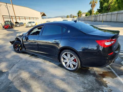 2014 Maserati Quattroporte, VIN ZAM56RRA2E1110212. Фото 2 з 6 з аукціону Copart. Каталог авто зі США OpenDataCar.