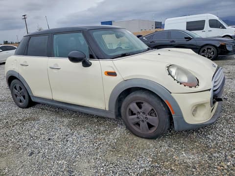 2015 Mini Cooper, VIN WMWXS5C51FT828379. Фото 4 з 6 з аукціону Copart. Каталог авто зі США OpenDataCar.