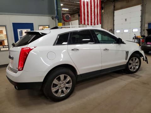 2015 Cadillac SRX, VIN 3GYFNEE38FS625219. Фото 3 из 6 с аукциона Copart. Каталог авто из США OpenDataCar.