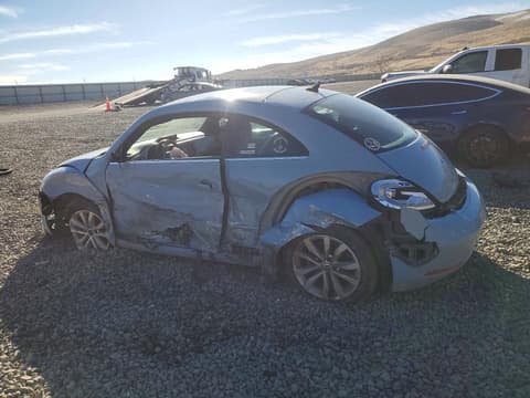 2014 Volkswagen Beetle, VIN 3VWRL7ATXEM637155. Фото 2 з 6 з аукціону Copart. Каталог авто зі США OpenDataCar.