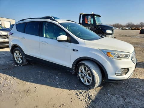 2017 Ford Escape, VIN 1FMCU0GDXHUE55710. Фото 4 з 6 з аукціону Copart. Каталог авто зі США OpenDataCar.