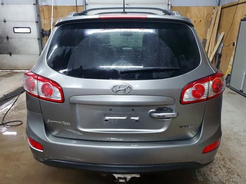 2012 Hyundai Santa Fe, VIN 5XYZKDAG8CG101547. Фото 6 з 6 з аукціону Copart. Каталог авто зі США OpenDataCar.
